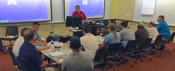 Tom Collins teaches  TTT class at NTI