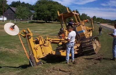 Direct burial fiber optic cable installation - plowing in cable