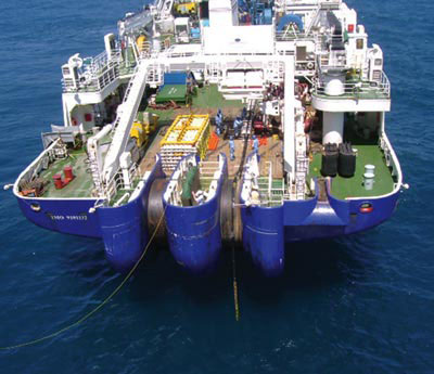 Submarine fiber optic cable installation - cable-laying ship